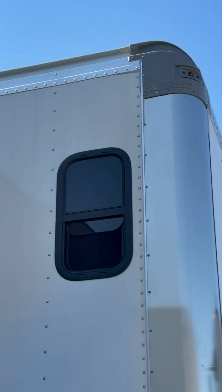 In-cab sleeper system installed on a box truck